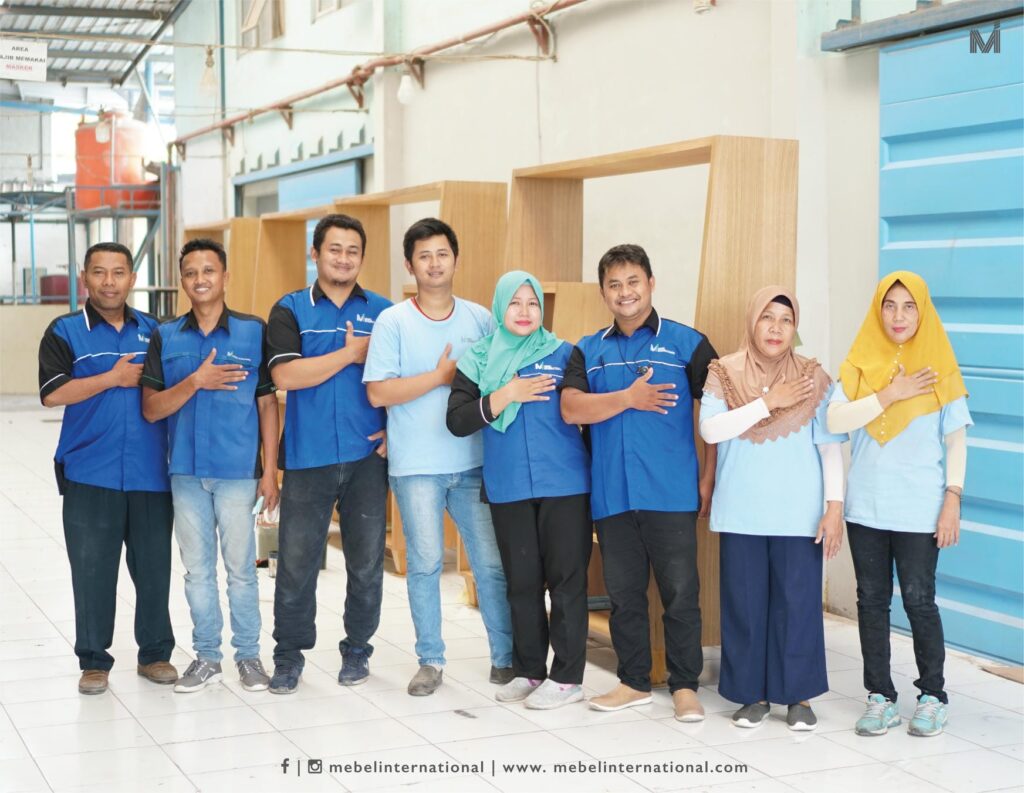 Team at Mebel International furniture manufacturer standing in Semarang workshop