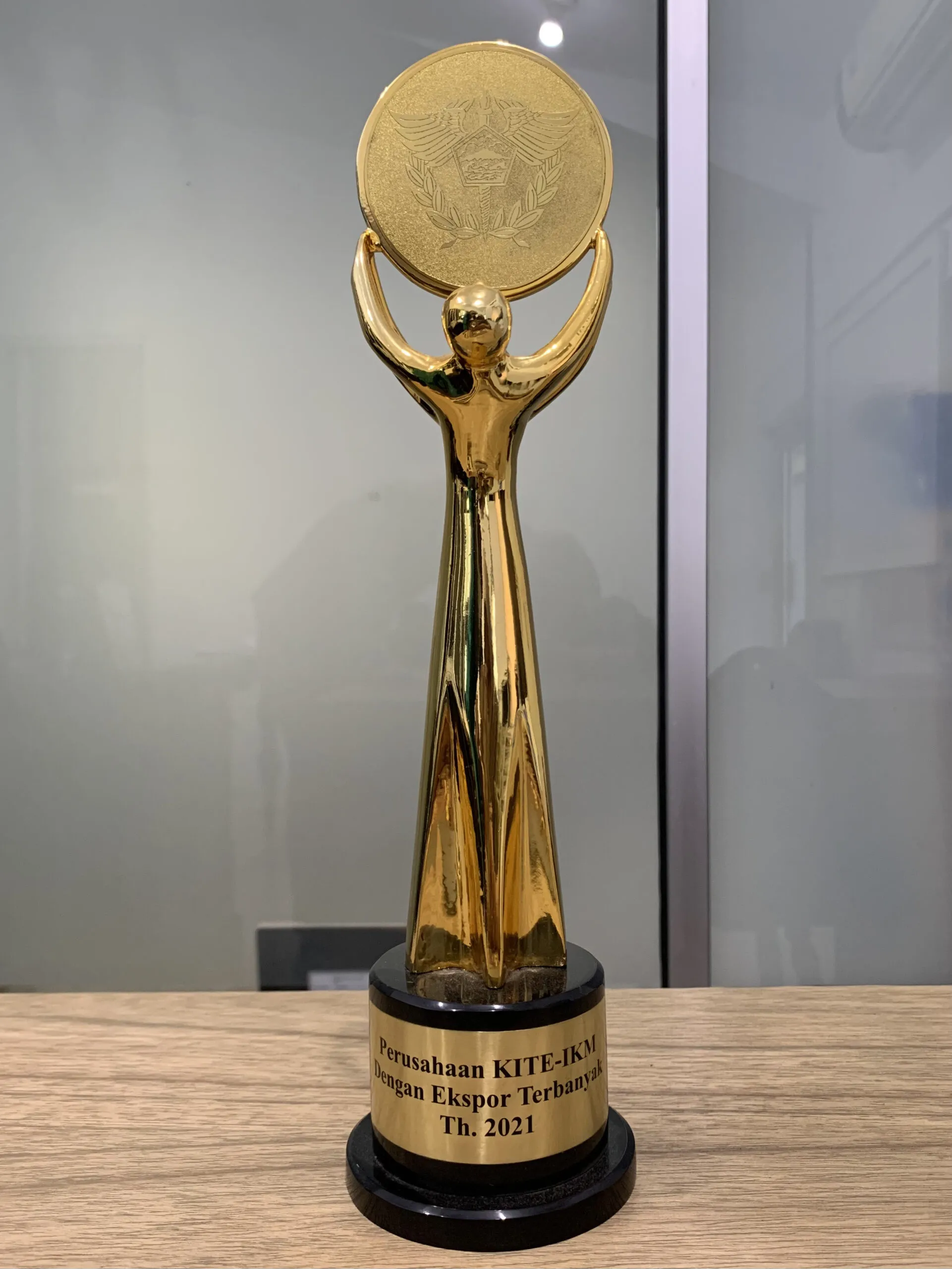 Export award trophy displayed at Mebel International furniture manufacturer office